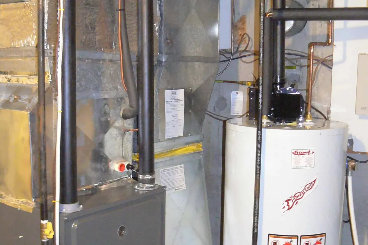 New high-efficiency gas furnace installed in a San Francisco basement mechanical room