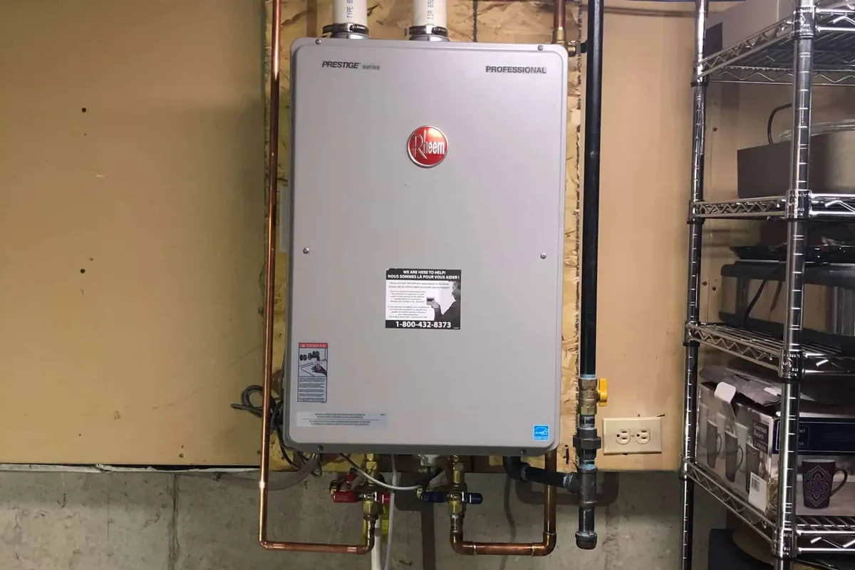 Rheem tankless water heater installed on a wall in a San Francisco basement