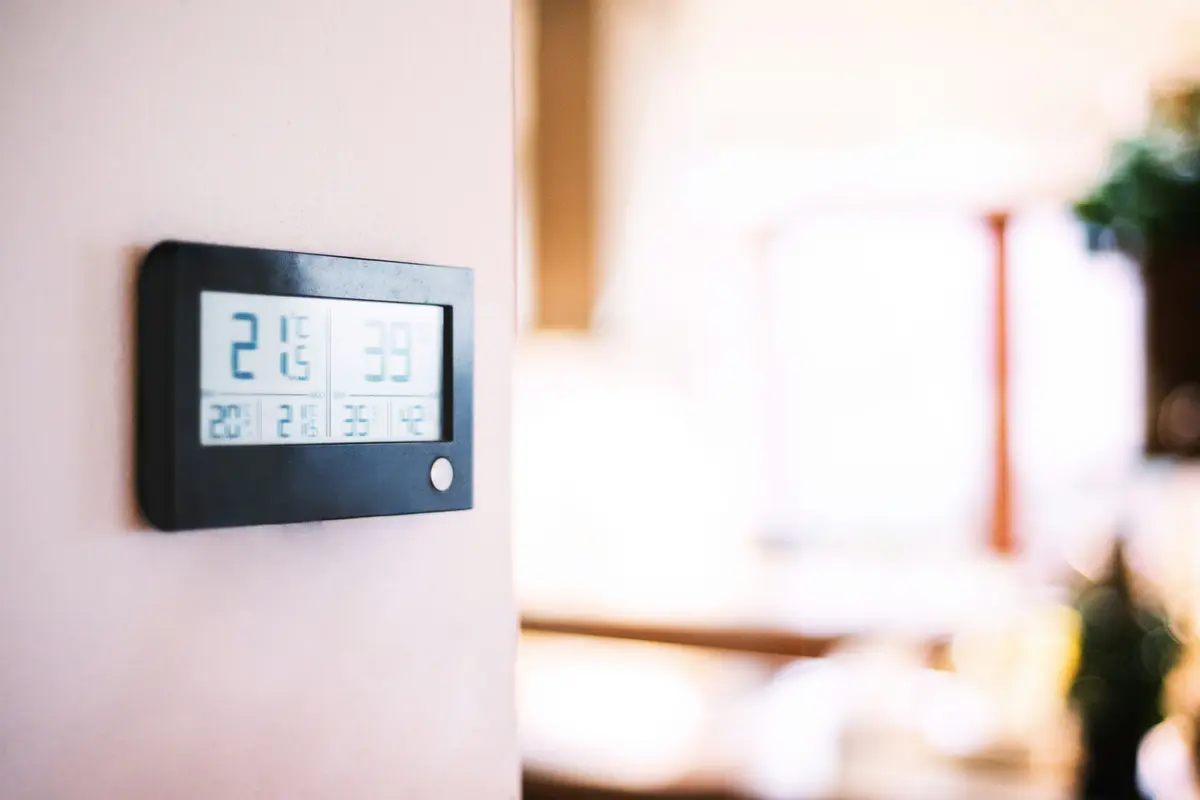 Modern smart thermostat on a residential wall in San Francisco
